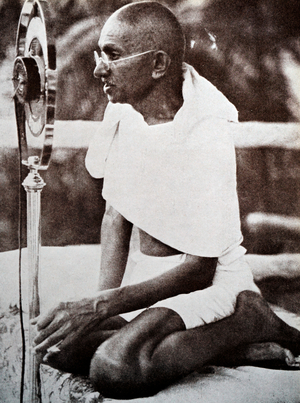 Mahatma Gandhi addresses a rally in Mumbai using a radio microphone, 1931