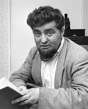 Oslo 1963. Author Finn Bjørnseth reads in book …, 1963 (photo)
