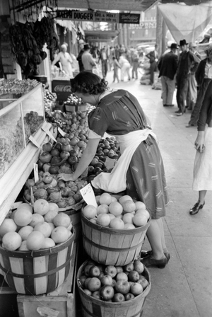 Saleswoman at grocery store, Waco, Texas, 1939 (b/w photo)