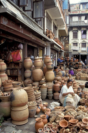 Nepal, Kathmandu. Pottery Merchants In  The Market Place.
