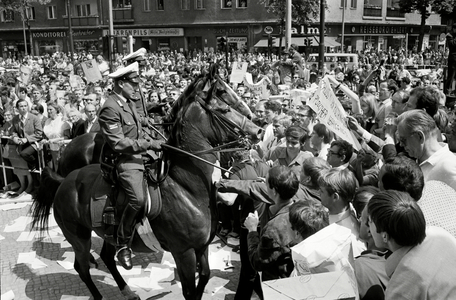 Mounted police push back demonstrators in Berlin, 1967 (b/w photo)
