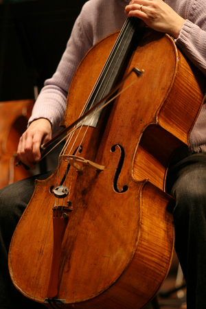 Cello - cello being played with a bow.