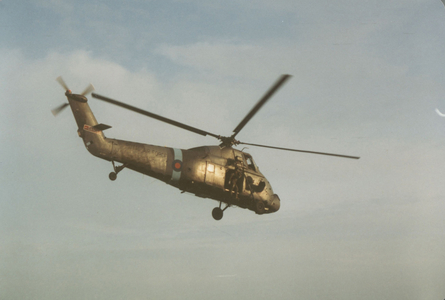 A Helictopter Flying Over the Falklands, 1982 (photo)