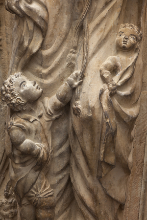 Cathedral Catedral de Nuestra Señora de la Huerta. Exterior. The north portal. Juan de Talavera. Detail. The voussoir: central figure. Late baroque.