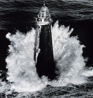 Photograph of rough weather hitting a lighthouse