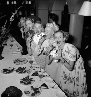 American "Girls" in Paris eating French cakes, July19, 1949 (b/w photo)