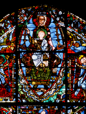 Chartres Cathedral, Stained glass window depicting 4 panels of stained glass above the west portal: Rose window (top), Passion (Left), Nativity (center), & Jesse (right) (stained glass)