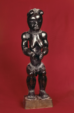 Female reliquary figure (wood & bronze)