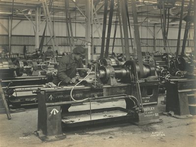 Boring to fit the disc, rough and finish facing at the National Projectile Factory, Birtley, UK, 14 June 1916 (b/w photo)
