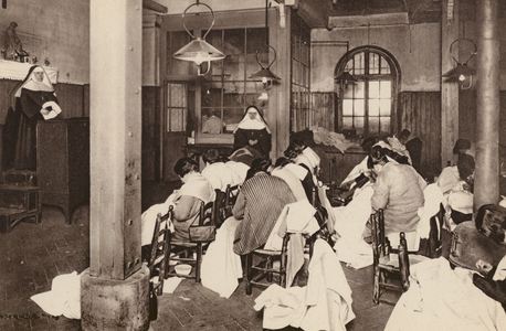 Paris: Ouvroir de detenues, a la prison St-Lazare; Workroom of the prisoners at "St-Lazare" (b/w photo)
