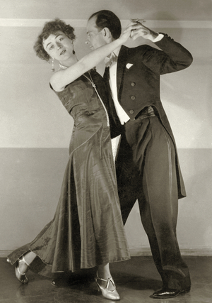 Couple while dancing tango, 1929 (b/w photo)