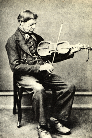 Myllargutten (Targjei Augundsson) playing Hardanger fiddle