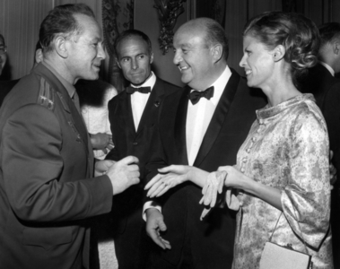 Premiere Of The Sovietic Film “War And Peace” From Tolstoi's Work At The Kinepanorama From The Avenue La Motte Piquet In Paris Here Cosmonaut Leonov Talking With Bernard Blier And His Wife On April 27, 1966 (b/w photo)