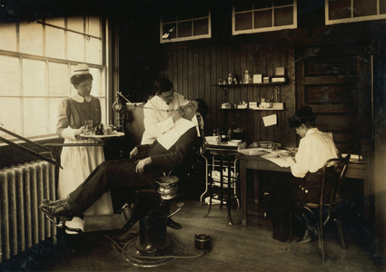 Dental work in Hospital. Hood Rubber Co., Cambridge, 1917 (b/w photo)