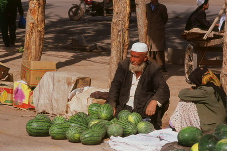 China: Watermelon seller at the Livestock Market, Kashgar, Xinjiang Province