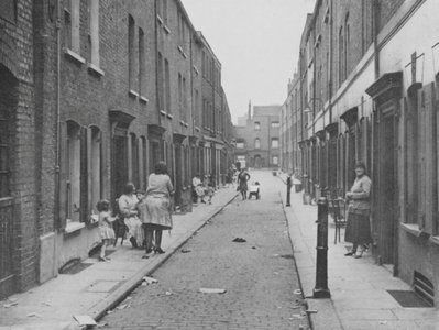Street in Whitechapel, London (b/w photo)