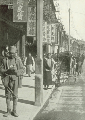 China, c 1909: Native Shops in Shanghai (b/w photo)