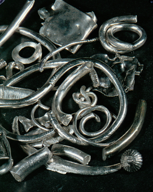 Scraps of silver ornaments bent and broken by a jeweller for smelting down and recasting (silver)
