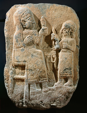 Tomb-stele, woman with distaff, child