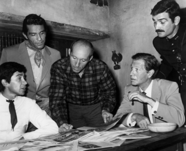 To Studios De Billancourt Jose Giovanni (Checked Shirt) Giving Directions To His Actors (From Left to Right) Xavier Marc Marco Antonio Arzate Augusto Benedico And Carlos Lopez Figueroa For His Film “The Raptor” December 28, 1967 (b/w photo)