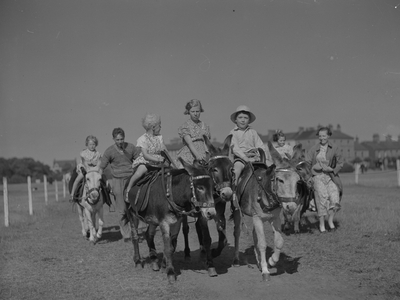 A view of children having donkey rides at Silloth, 1930s-60s (b/w photo)