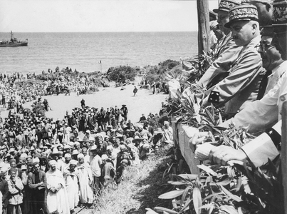 The General Henry Martin (2nd in right) during the official ceremony for the surrender of the tribe near Kherrata, on May 22 1945. On May 8, 1945, colonial army organized massacres in Setif, Guelma, Kherrata against algerians who wanted a beggining of independance