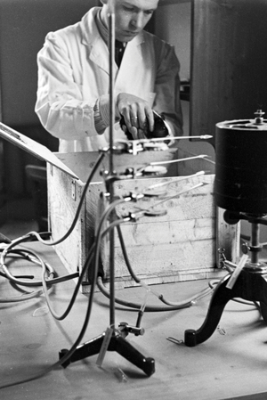 A scientific experiment being prepared, Germany 1930s (b/w photo)