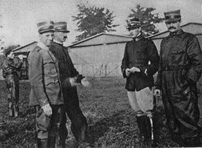 Pioneers of Italian aviation: The 1st military squadron at Mirafiori in 1913. On the field from the left: second lieutenant Brunetta. captain Moizo. second lieutenant Regazzoni and Laureati. 1913. Italy.
