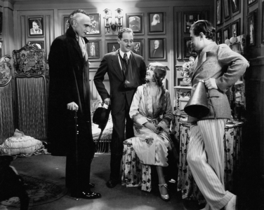 Conrad Veidt, Ernst Laemmle, Mary Philbin and Pal Fejoes during the filming of 'The Last Performance', 1929 (b/w photo)