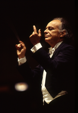 Lorin Maazel. Portrait photograph taken of the musician conducting in Paris, 1995. American conductor, born in 1931.