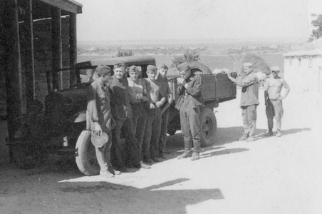 Soldiers Smoking and Relaxing in the Sun, 1942 (b/w photo)