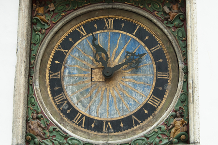 Close-Up of A Clock at Holy Spirit Church in Tallinn, Estonia (photo)