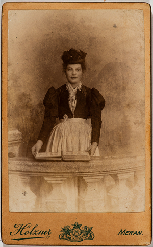 Portrait of a young woman from Southern Tyrol photographed with traditional clothes, Meran, Italy, 1879 (photo)