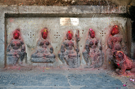 5th century sculpture of five Matrikas (Mother Goddesses, Hinduism) in Ganesh temple at Bagh Bhairav in Kirtipur, Kirtipur, Kathmandu Valley, Nepal (photo)