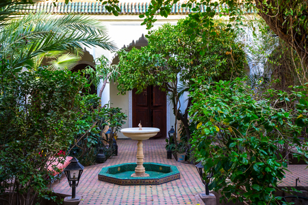 Inner courtyard of traditional Moroccan house, old town medina, Marrakesh, Morocco September 2018 (photo)