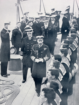 King George V of England reviewing the crew of the battleship Iron Duke in 1914.