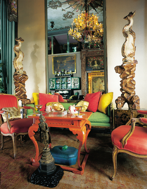 A pair of Italian Baroque style dolphins (polychrome-painted & parcel-gilt wood)