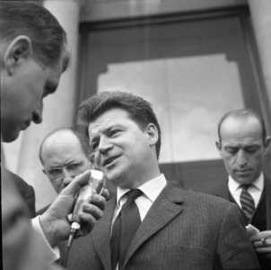 M.Debatisse questioned by a journalist, 1964 (b/w photo)