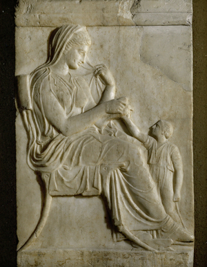 Sitting young woman and child …