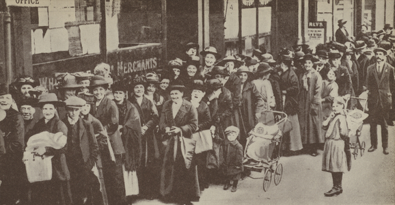 People queuing for their sugar ration on a South London street, World War I, 1918 (b/w photo)