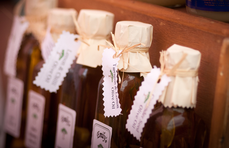 Olive oils on market stall, 2011 (photo)