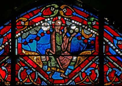 Window w21 depicting God the Creator creates the Heavens and the Earth (stained glass)