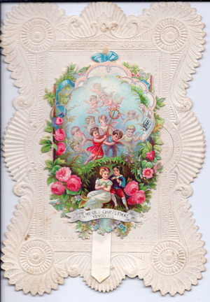 A Victorian deckle edge embossed mechanical Christmas card with an image of cupids and flowers, c.1880 (colour litho)