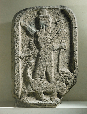 Ishtar, goddess of love, standing on her iconographicanimal, the lion …
