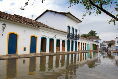 Tide flooded colonial era street, Historic Center District, Paraty, Brazil, March 2018 (photo)
