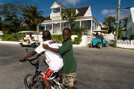Children in a bicycle and loyalist home, Bahamas (photo)