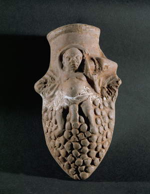 Terracotta flask in the form of a raisin and a pigmy holding a small amphora …
