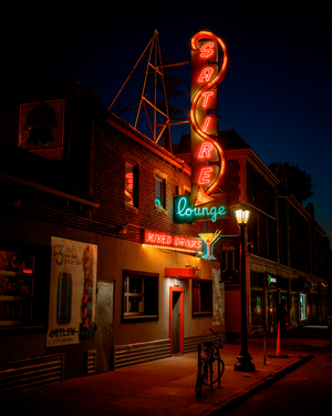 Pete's Satire Lounge neon sign at night on Colfax Avenue, Denver, Colorado, United States, 2025 (photo)