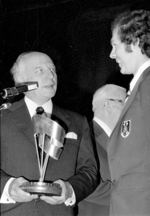 Walter Scheel and Franz Beckenbauer at the celebration of the World Cup victory in Munich, 1974 (b/w photo)