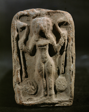 Nude goddess. Clay plaque, bas-relief (clay)